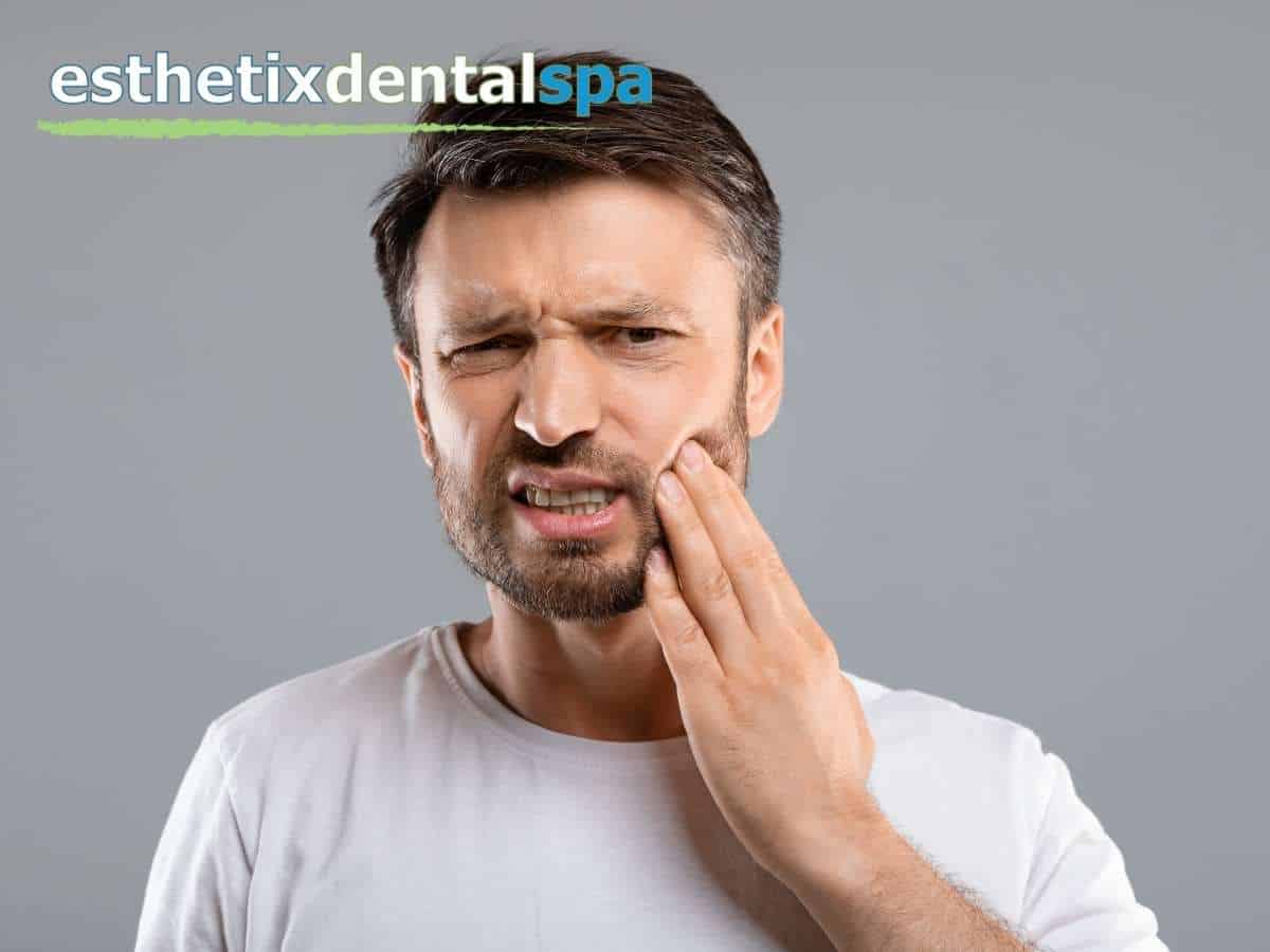 A man with toothache due to a missing tooth in Washington Heights, NY.