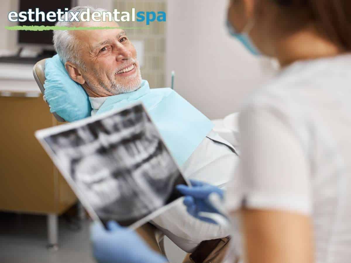 Senior Dental Patient Checking His Dental Implants In NY Dental Office