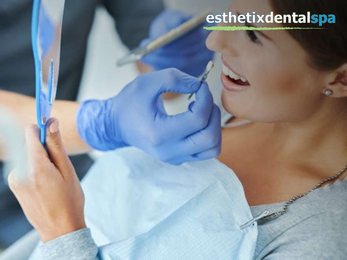 Washington Heights dentist Bonding a female’s patient teeth 
