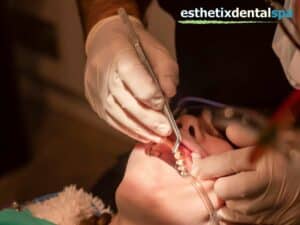 Smiling person with braces showing orthodontic treatment results