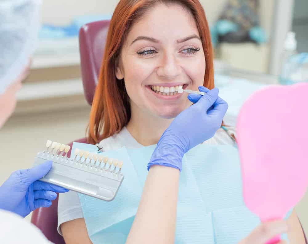 Check And Select The Color Of The Teeth In The Dentists Chair. D