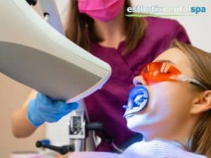 Patient undergoing a Laser Dentistry procedure at Esthetix Dental Spa, wearing protective glasses while receiving advanced dental treatment